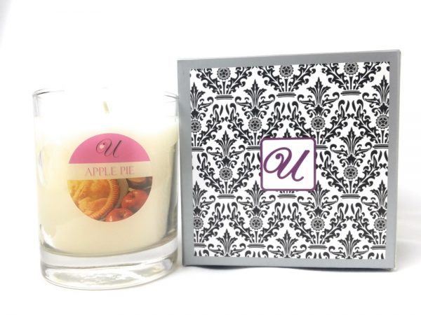 candle with jewelry inside