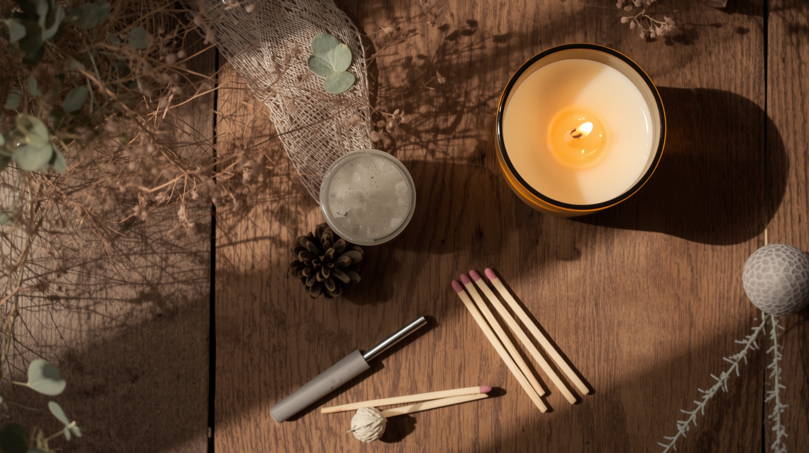 Lucid_Origin_A_cozy_aesthetic_flat_lay_showing_elegant_candle__2 Welcome to Unrivaled Candles